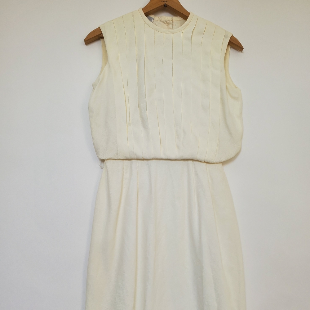 Yonkers soft white pleated dress.